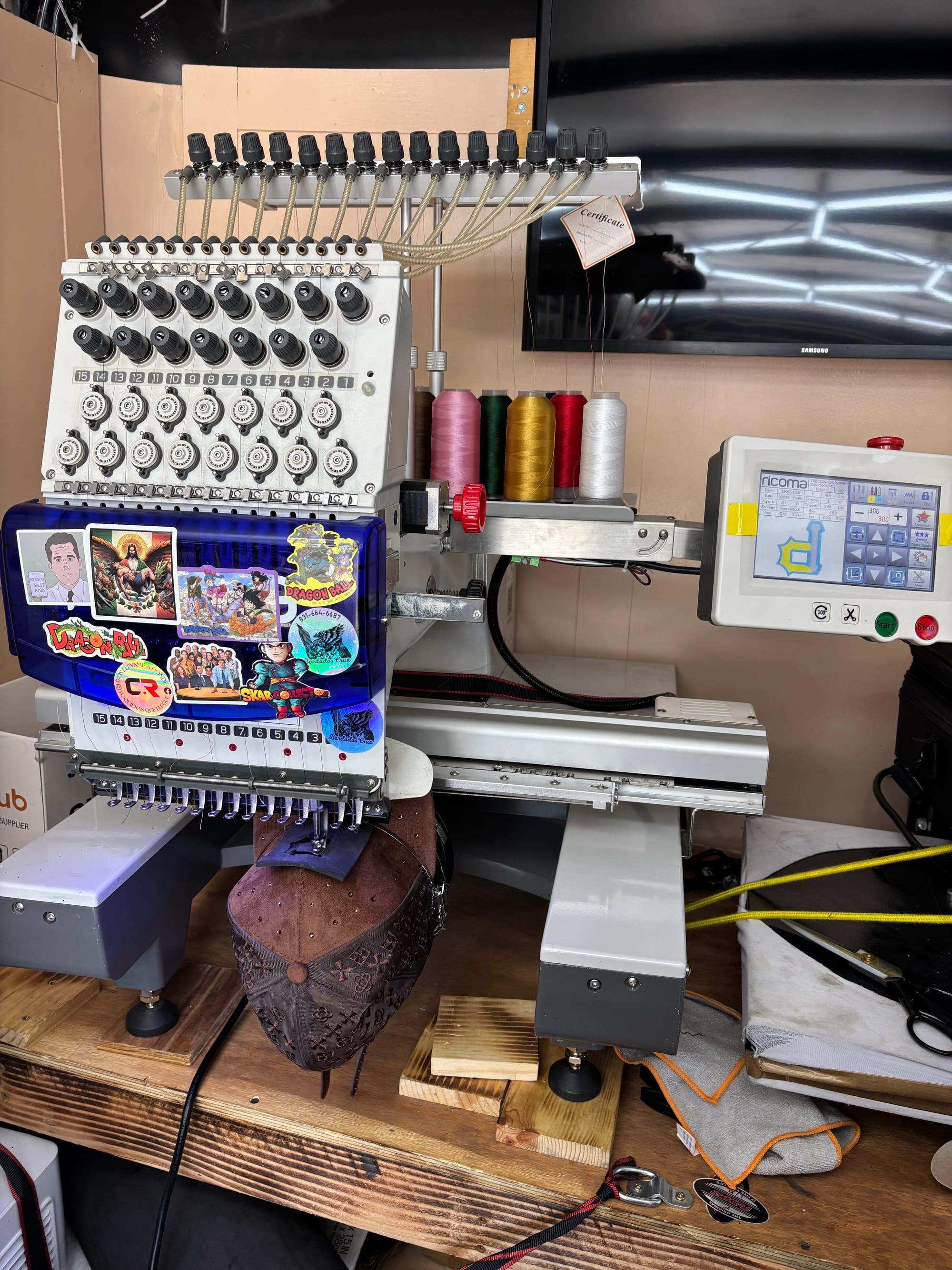 CR's multi-needle embroidery machine inside the mobile workshop